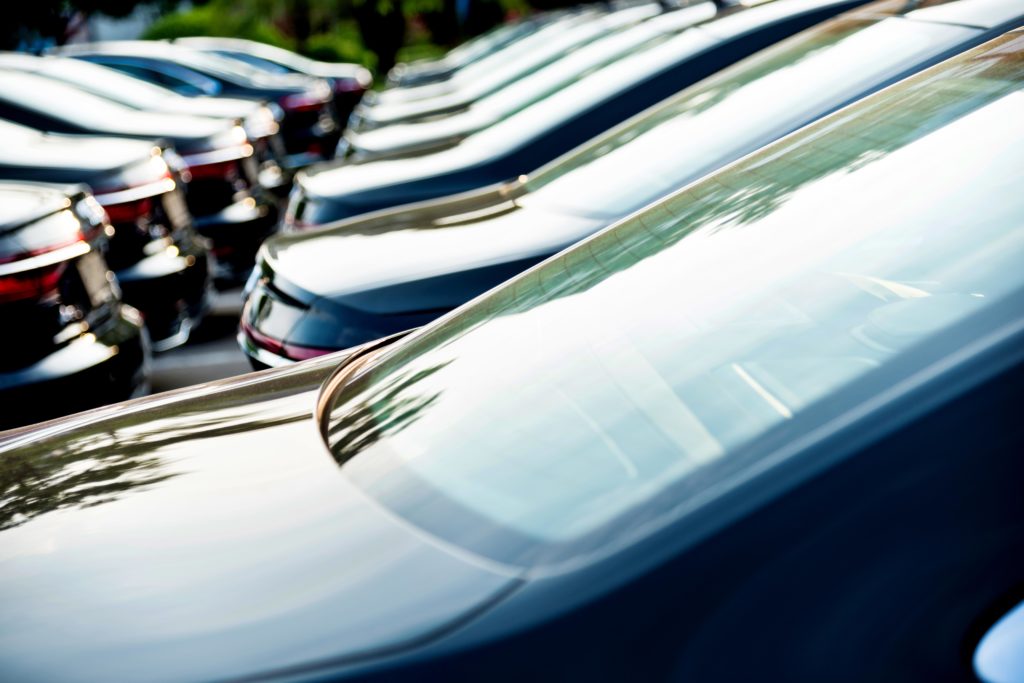 image of row of vehicles evoking When to replace fleet vehicles